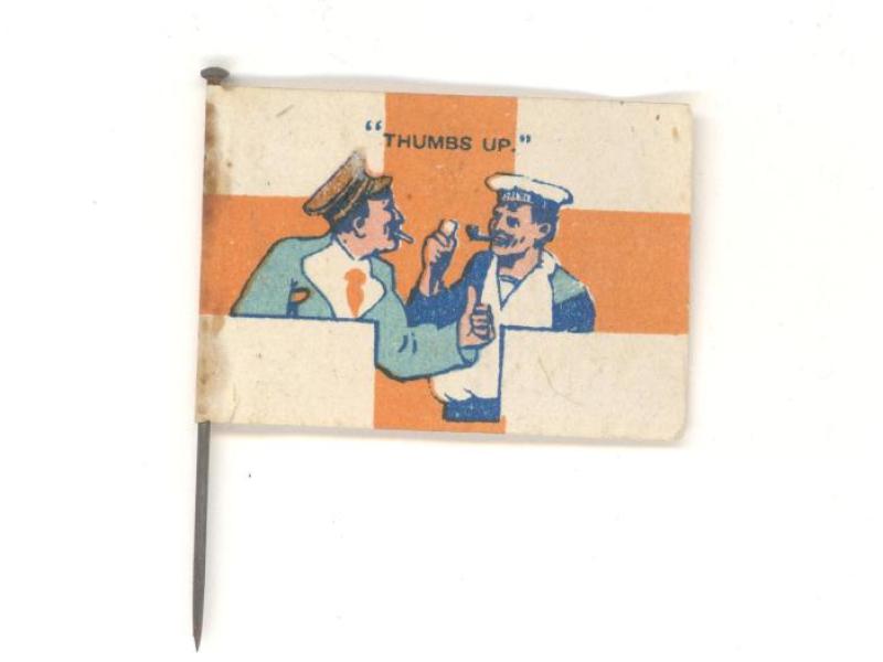 File:Flag pin showing wounded WW1 soldiers enjoying smoking.jpg