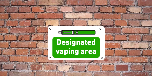 Designated vaping area signage, showing an electronic cigerette icon in green, with the text designated vaping area also in green bold type