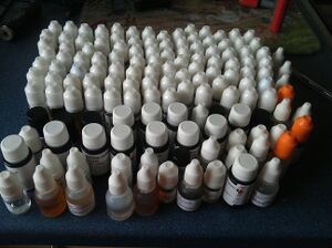 Many bottles of flavourings (suitable for vaping)